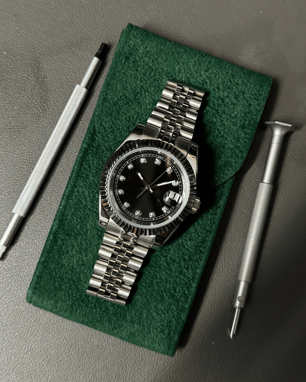 black diamond index Seiko mod automatic watch with stainless steel bracelet, product shot