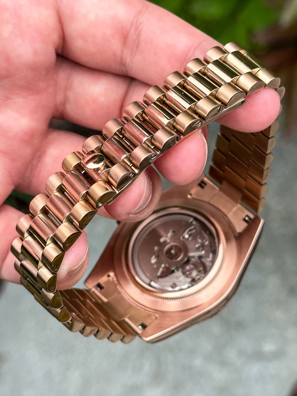 brown Arabic dial rose gold Seiko mod automatic watch, product shot