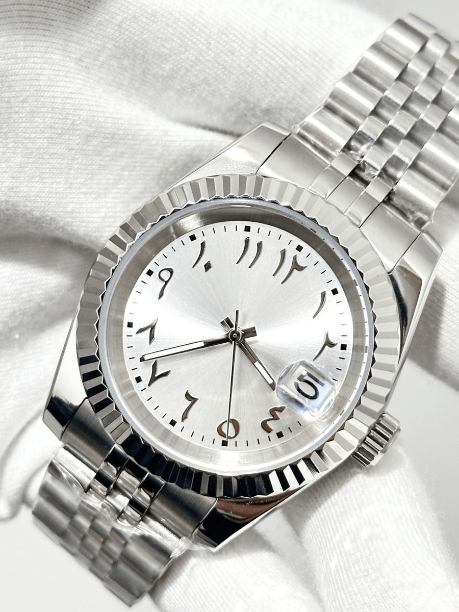 silver Arabic Seiko mod automatic watch with stainless steel bracelet, dial shot