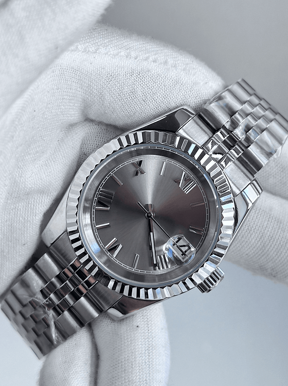 grey Roman dial stainless steel Seiko NH35 mod watch on jubilee bracelet, anlge shot no logo