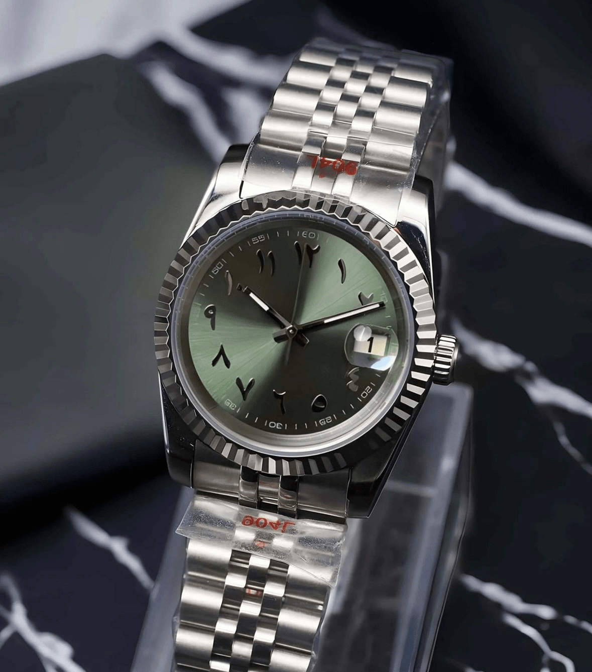 olive green Arabic Seiko mod automatic watch with stainless steel bracelet, product shot